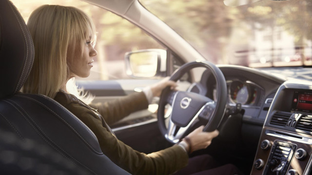 Woman driving car dashboard eva free wallpaper - medium preview image