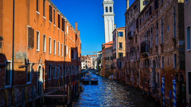 Narrow canal church steeple boat free wallpaper - medium preview image