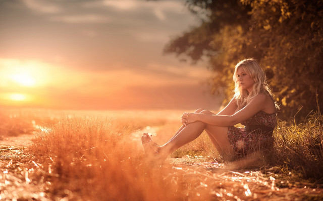 Woman sitting field sunset autumn free wallpaper - medium preview image