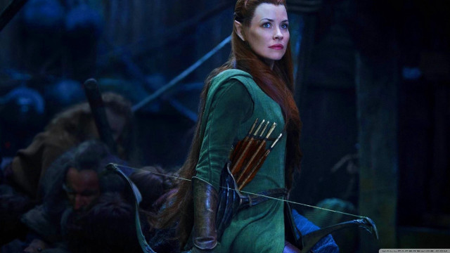 Woman green dress bow arrow free wallpaper - medium preview image