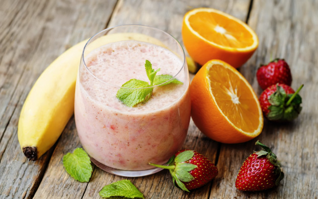 Smoothie strawberries oranges wooden table free wallpaper - medium preview image