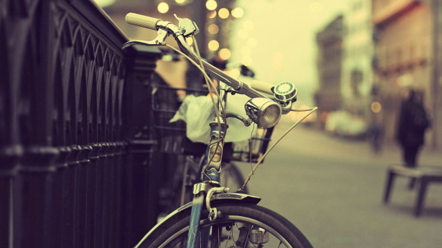 Bicycle fence streetcorner person bench free wallpaper - medium preview image