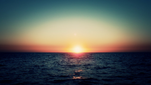 Sunset ocean boat sky horizon free wallpaper - medium preview image