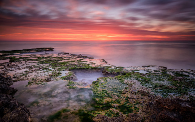 Rocky shore sunset hole matte free wallpaper - medium preview image