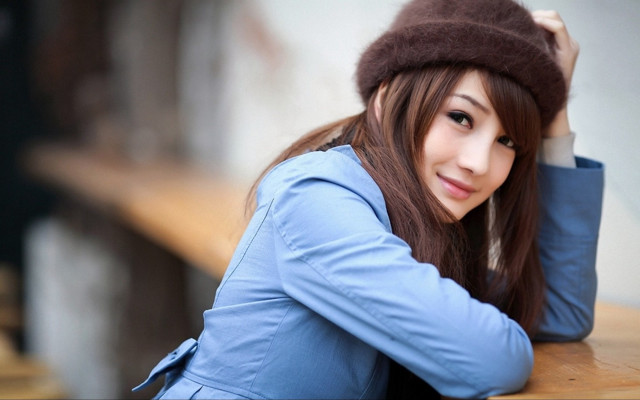 Woman hat leaning bench casual free wallpaper - medium preview image