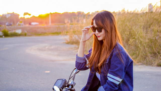 Red haired girl motorcycle sunset free wallpaper - medium preview image