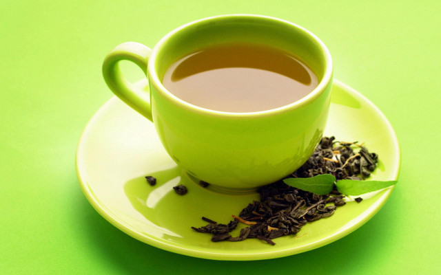 Tea leaf saucer green background free wallpaper - medium preview image