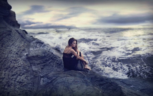 Woman ocean rock cloudy sunset free wallpaper - medium preview image