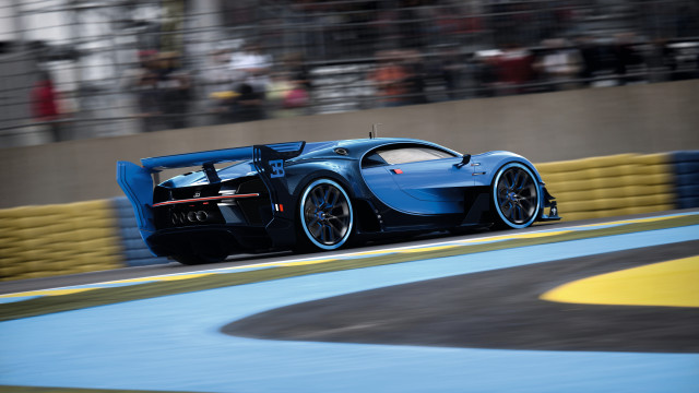 Blue racecar racing track crowd free wallpaper - medium preview image