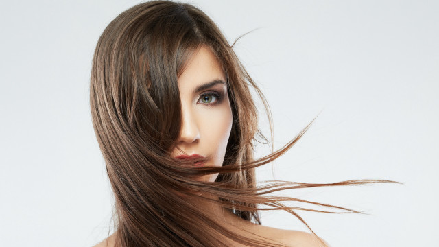 Woman blowing hair blue eyes #4 free wallpaper - medium preview image