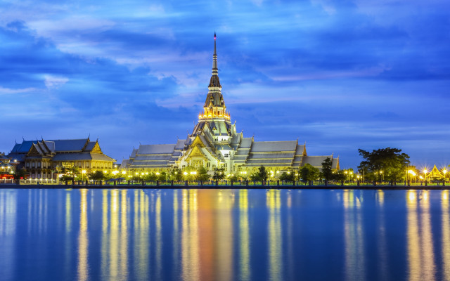Lit up spire building water free wallpaper - medium preview image