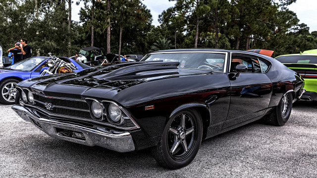 Black muscle car parked people free wallpaper - medium preview image
