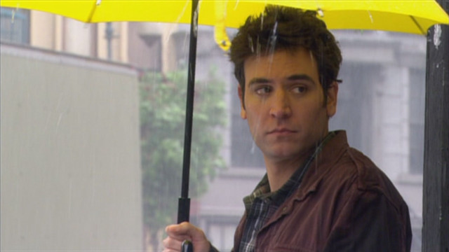 Man yellow umbrella rain city free wallpaper - medium preview image