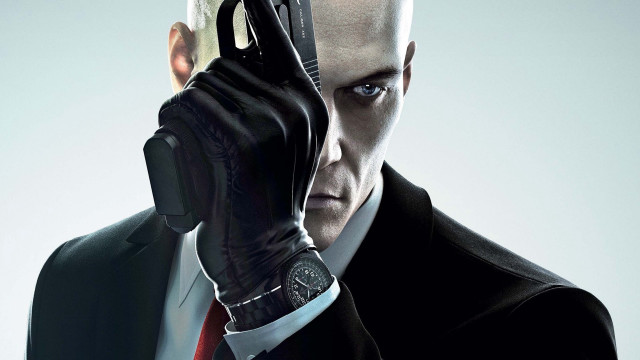 Man suit gun serious shokof free wallpaper - medium preview image