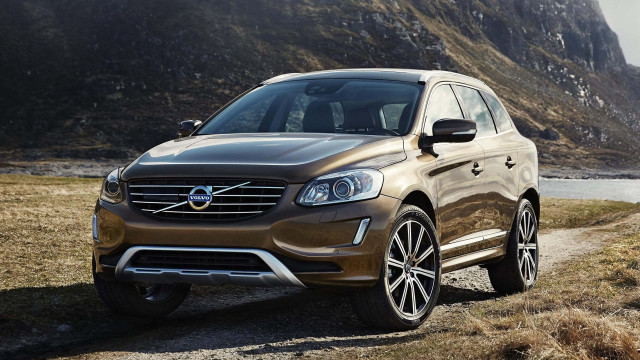 Brown volvo suv dirtroad mountain free wallpaper for desktop - medium preview image