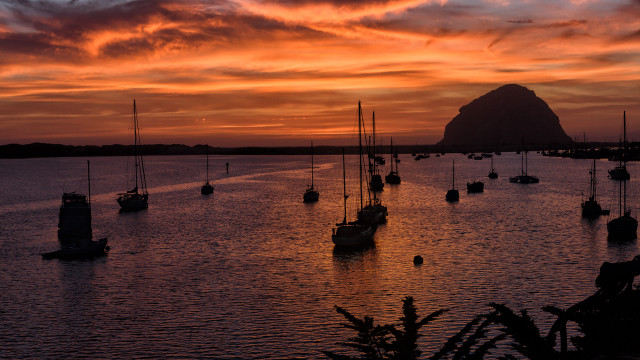 Sunset boats mountain red sky free wallpaper - medium preview image