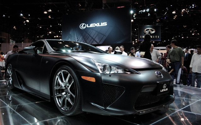 Lotus showroom people blonde brown free wallpaper - medium preview image