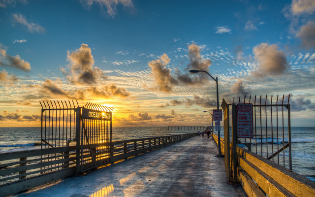 Pier sunset clouds fence lightpole free wallpaper - medium preview image