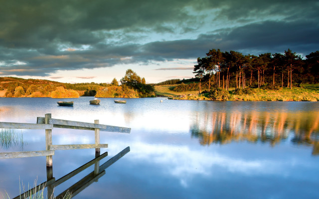 Lake fence boats cloudy sky free wallpaper - medium preview image