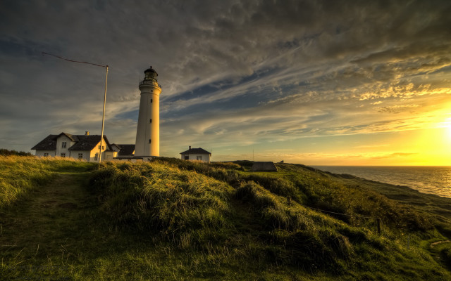 Lighthouse hill sunset cloudy sky free wallpaper - medium preview image