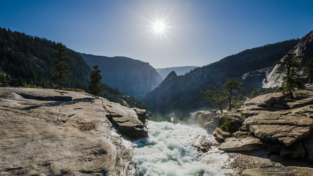 River rocks mountains valley sunlight free wallpaper - medium preview image