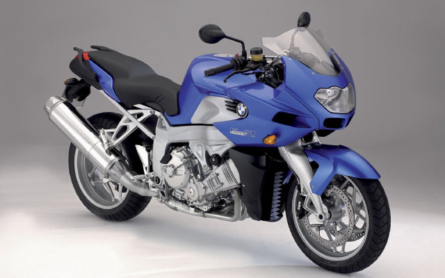 Blue motorcycle white surface gray free wallpaper - medium preview image