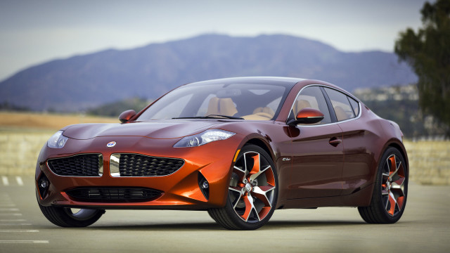 Red sports car mountains driver free wallpaper - medium preview image