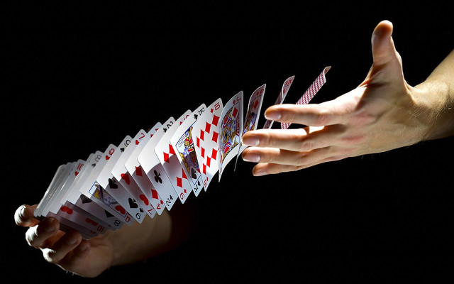 Hand stack cards black background free wallpaper - medium preview image