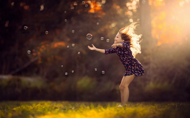 Girl bubbles field outdoors sunset free wallpaper - medium preview image