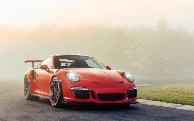 Red sports car foggy road free wallpaper - medium preview image