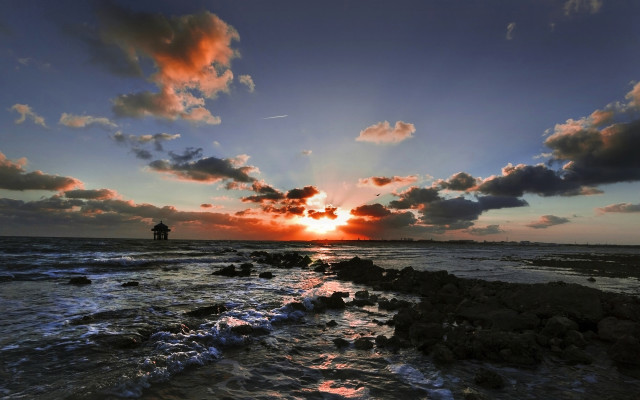 Person rock ocean sunset clouds free wallpaper - medium preview image