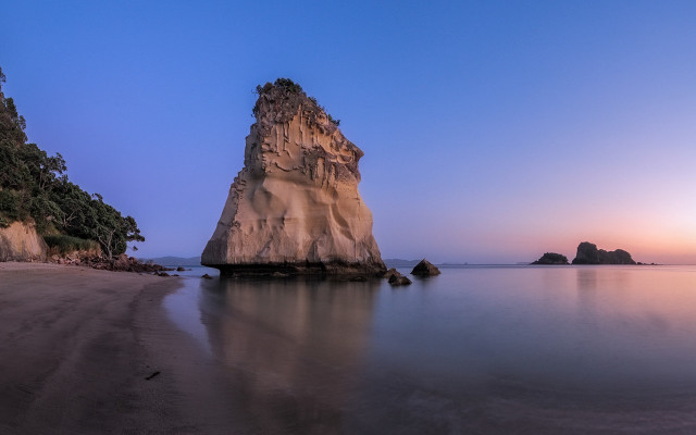 Rock outcrop water beach sunset free wallpaper - medium preview image