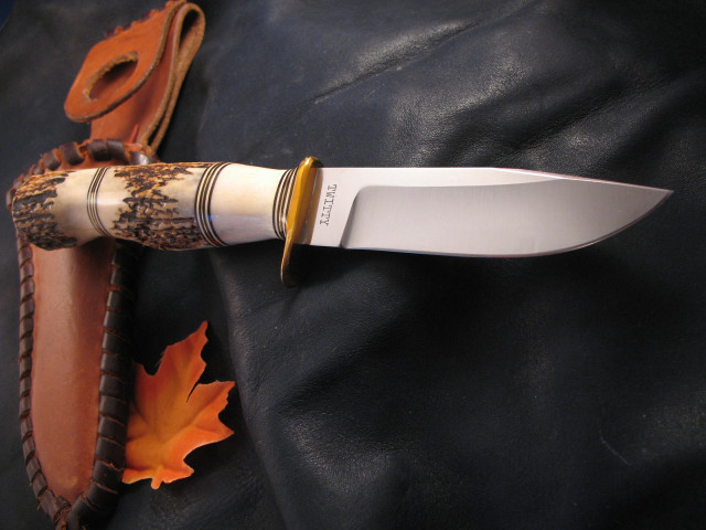 Knife gold handle black leather free wallpaper - medium preview image