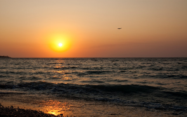 Plane ocean sunset horizon cloud free wallpaper - medium preview image