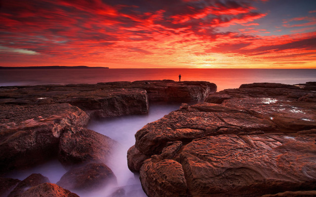 Rocky cliff sunset reflection water free wallpaper - medium preview image