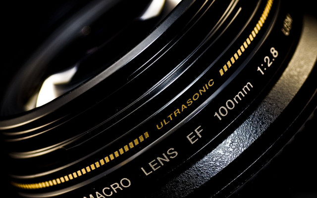 Camera lens closeup yellow stripe free wallpaper - medium preview image