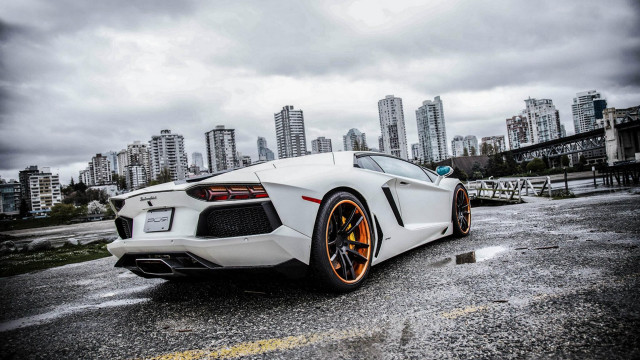 White sports car cityscape cloudy free wallpaper - medium preview image