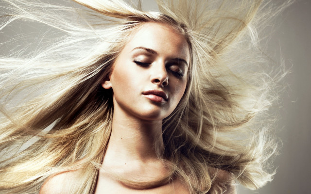 Woman blowing wind fur coat free wallpaper - medium preview image