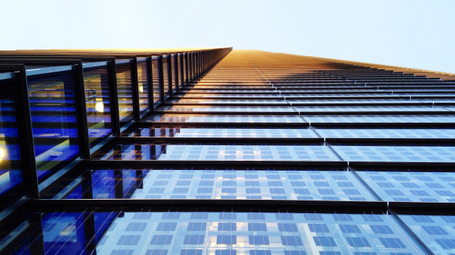 Tall building reflective windows tiltshift free wallpaper - medium preview image