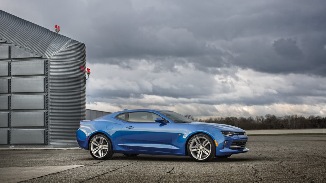 Blue car building cloudy sky free wallpaper - medium preview image