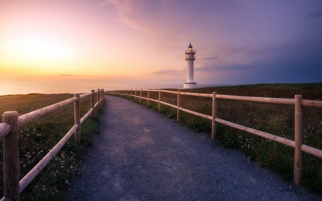 Lighthouse sunset path fence hill free wallpaper - medium preview image