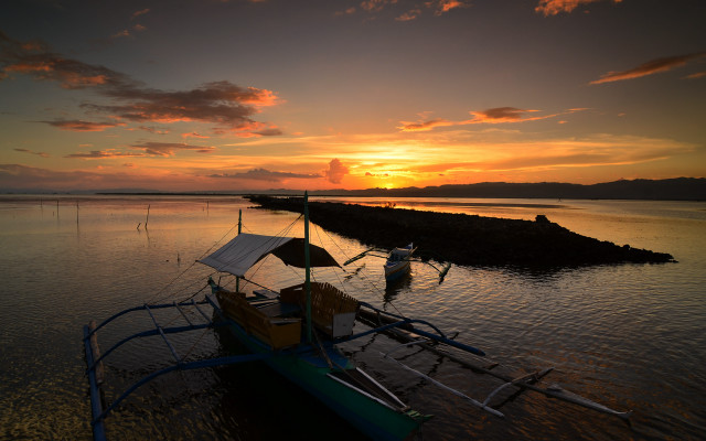 Boat sunset water clouds beach free wallpaper - medium preview image