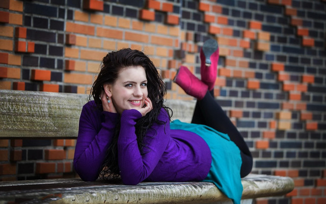 Woman bench urban brick blurry free wallpaper - medium preview image