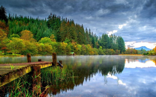Lake forest dock person sky free wallpaper - medium preview image