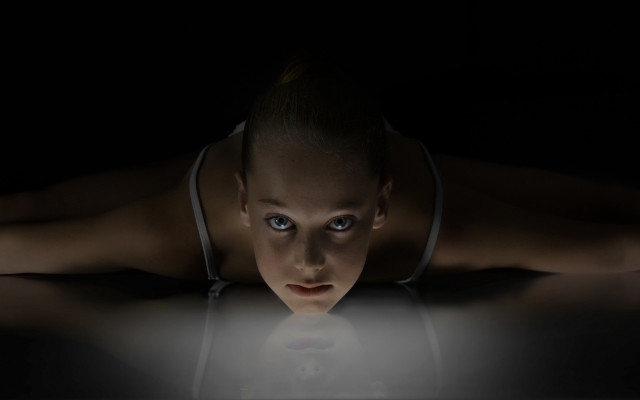 Woman hologram laptop dark background free wallpaper - medium preview image