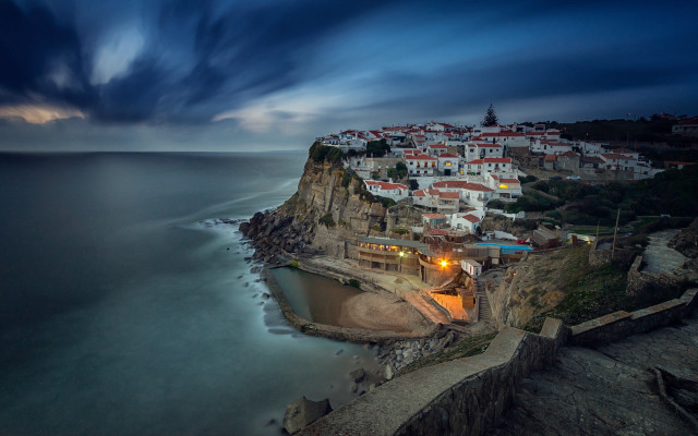 Small town cliff ocean night free wallpaper - medium preview image