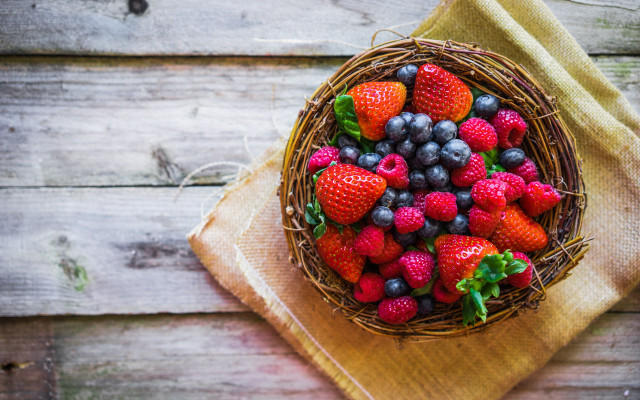 Basket berries wooden table arcimboldo free wallpaper - medium preview image