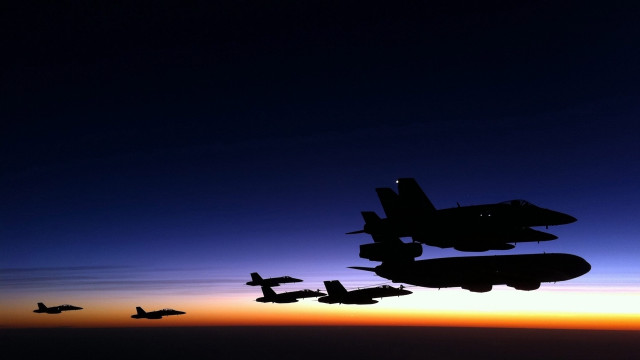 Fighter jet formation sunset backlit free wallpaper - medium preview image