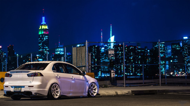 White car night city skyline free wallpaper - medium preview image