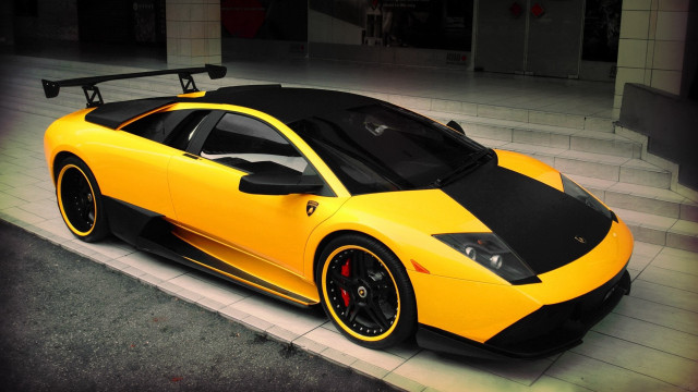 Yellow black sports car parking free wallpaper - medium preview image